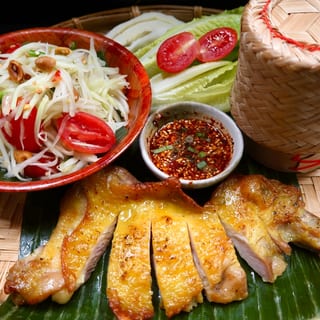 26. Grill Chicken with Som Tumm Sticky Rice